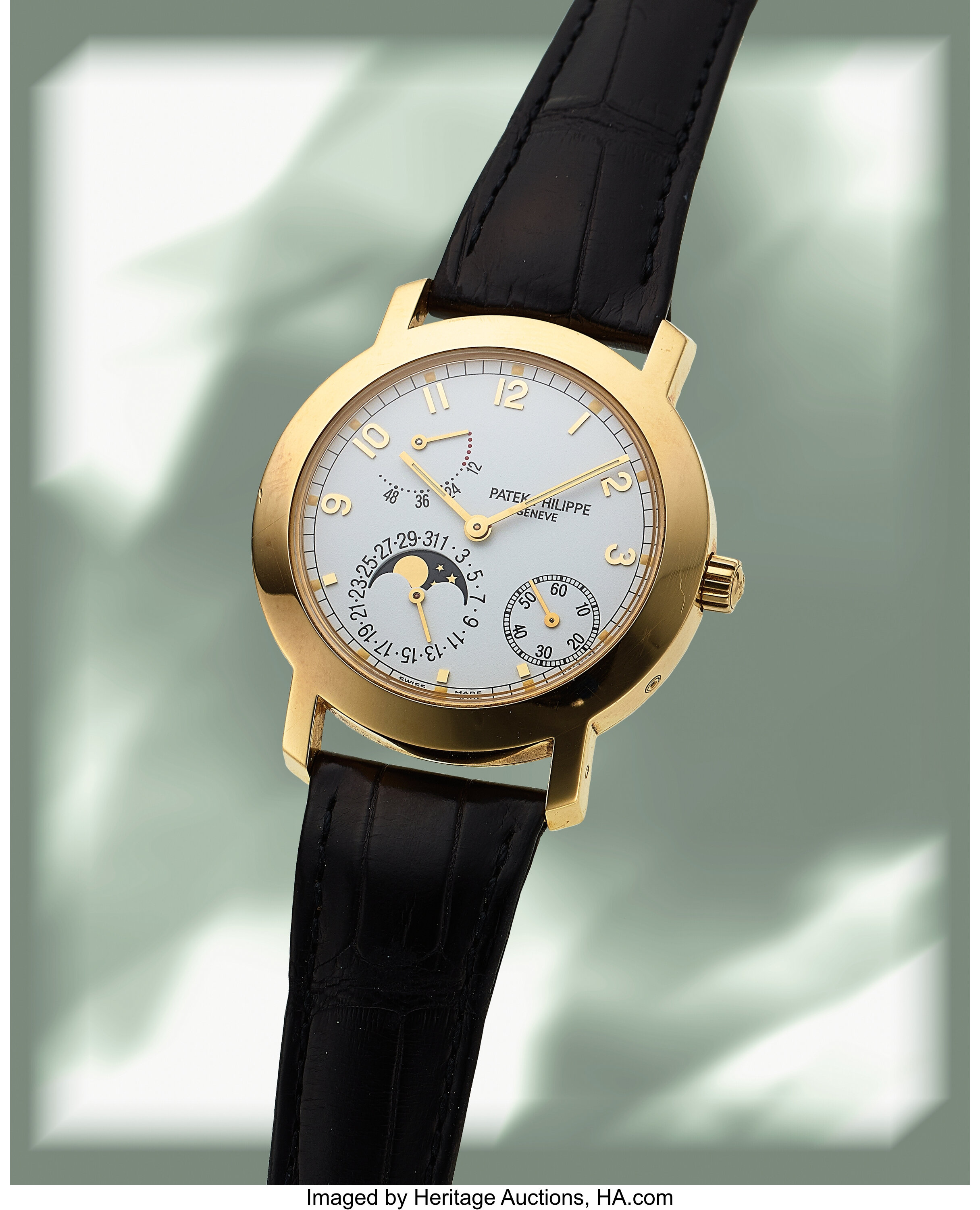 PATEK PHILIPPE, REF. 5055G, A FINE 18K WHITE GOLD WRISTWATCH WITH MOON  PHASES, DATE, AND POWER RESERVE