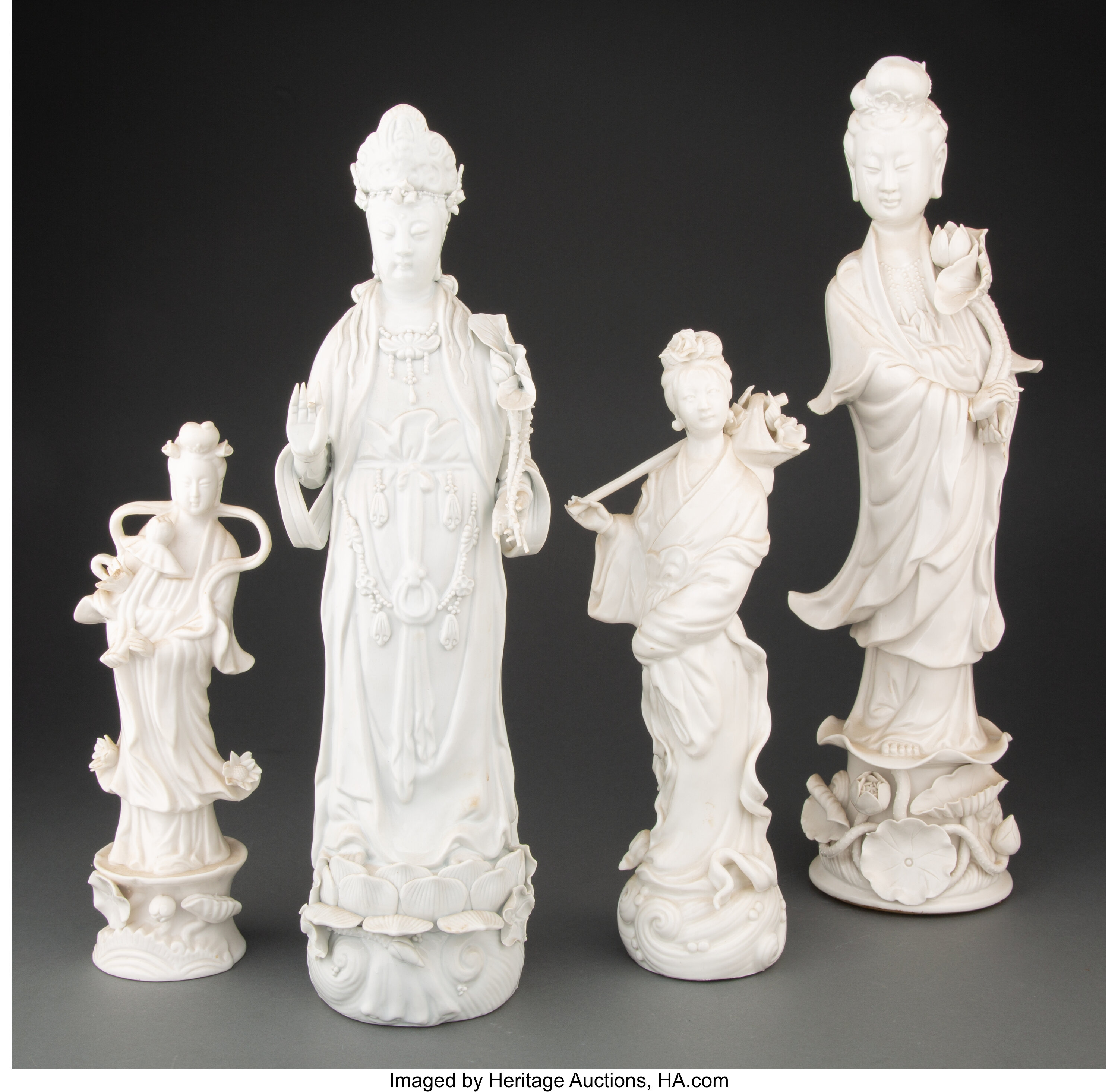 A Group of Four Chinese Blanc de Chine Figures. Marks to one: MADE ...