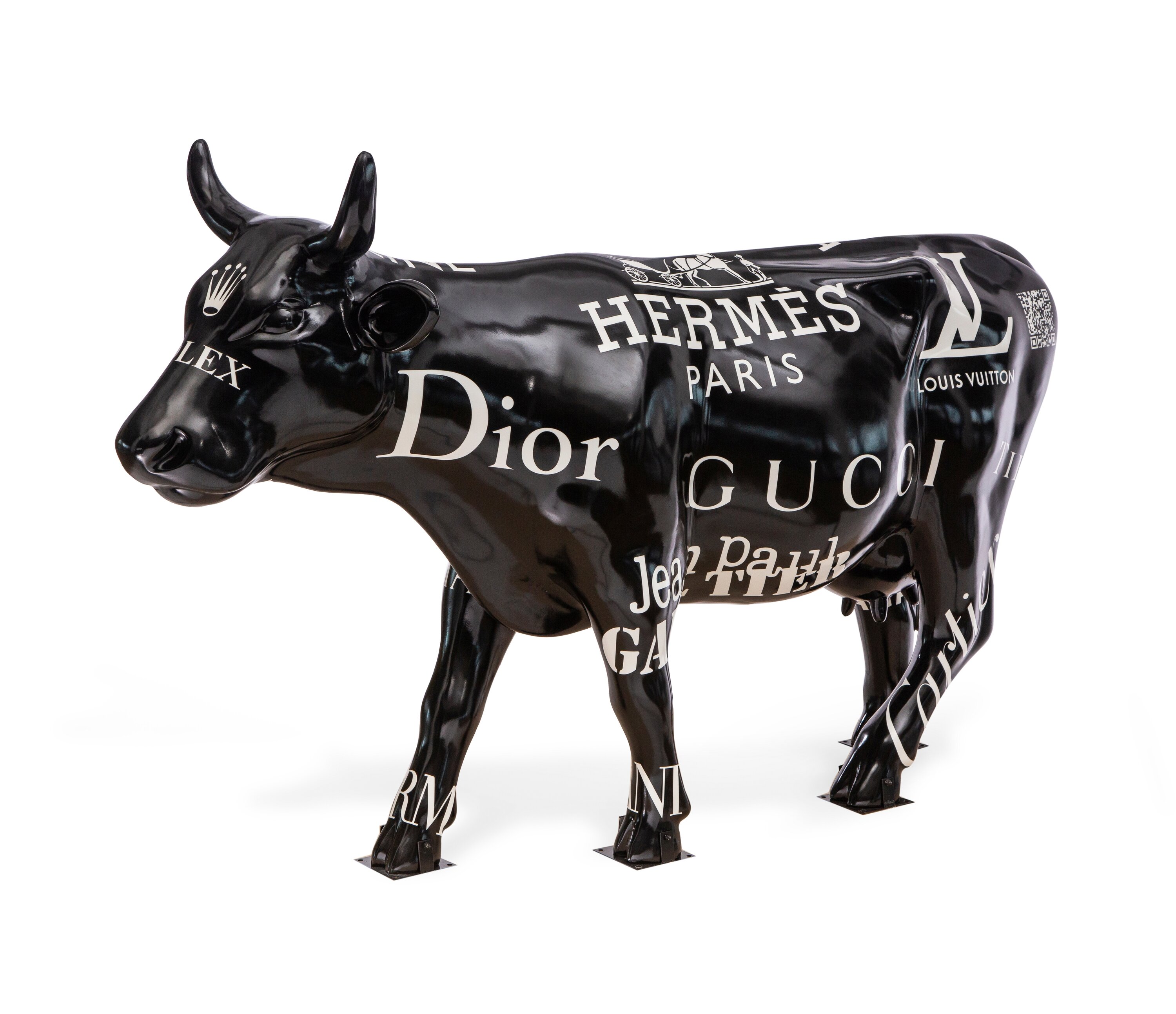 Dallas artist creates life-sized cow with Louis Vuitton logo