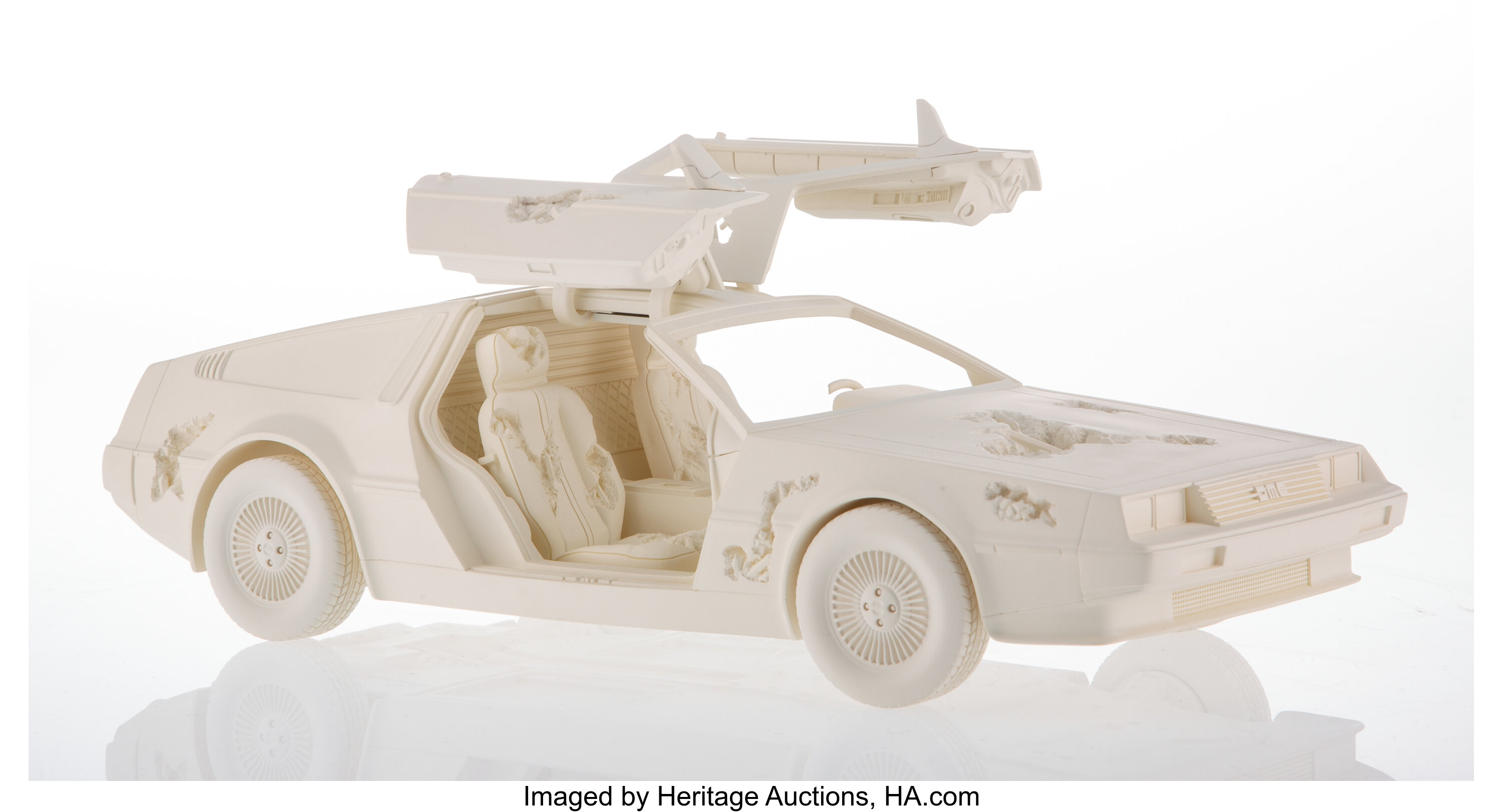 Daniel Arsham (b. 1980). Eroded Delorean, 2021. Resin, plaster