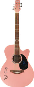 taylor swifts pink guitar