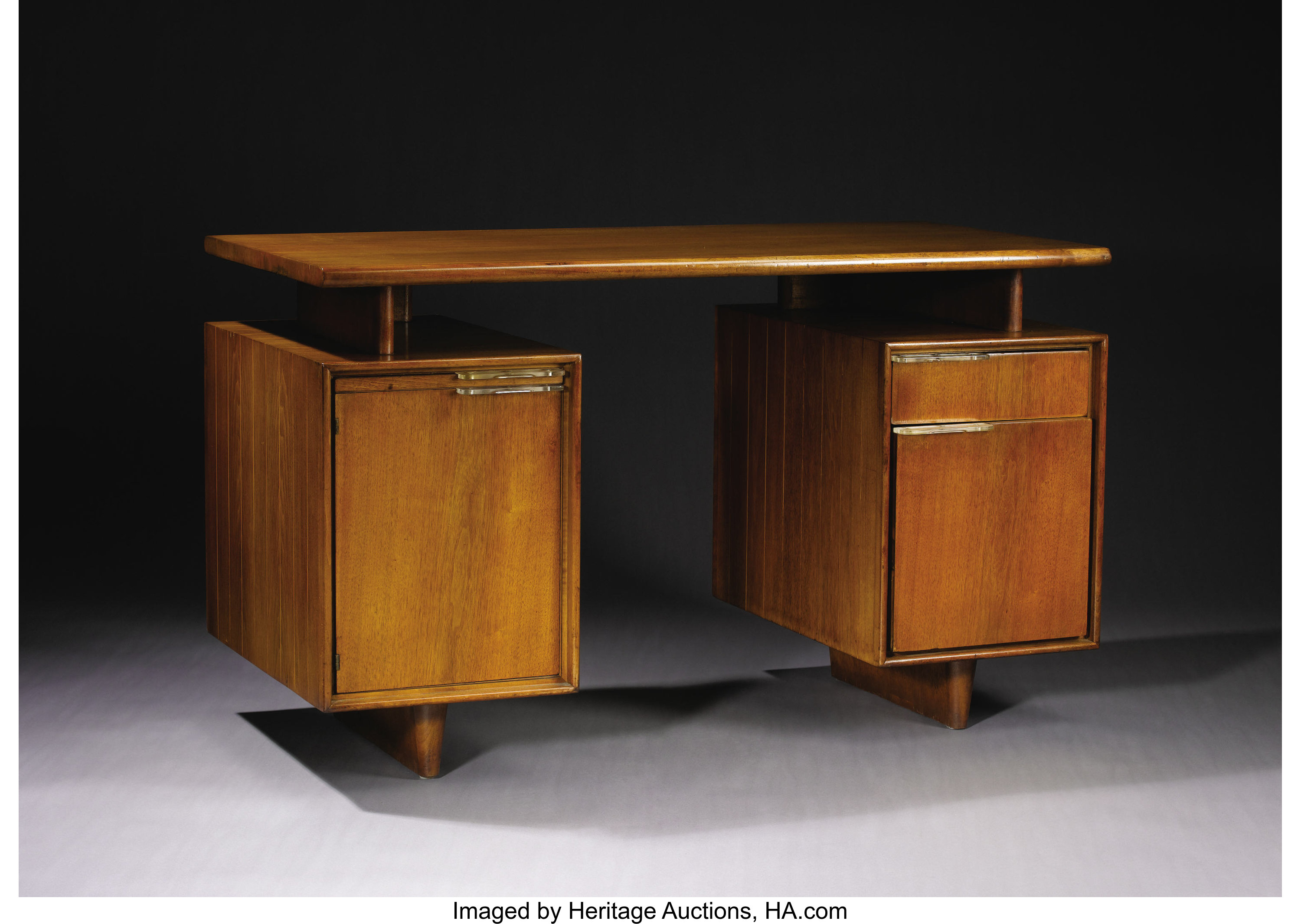 Gilbert Rohde American 1894 1944 A Walnut Desk From The All