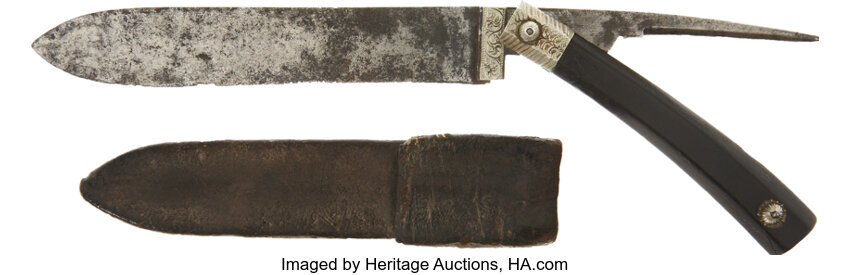 Sold at Auction: A sailors sheath knife and marlin spike