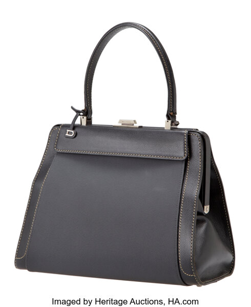 At Auction: 2 leather Delvaux handbags