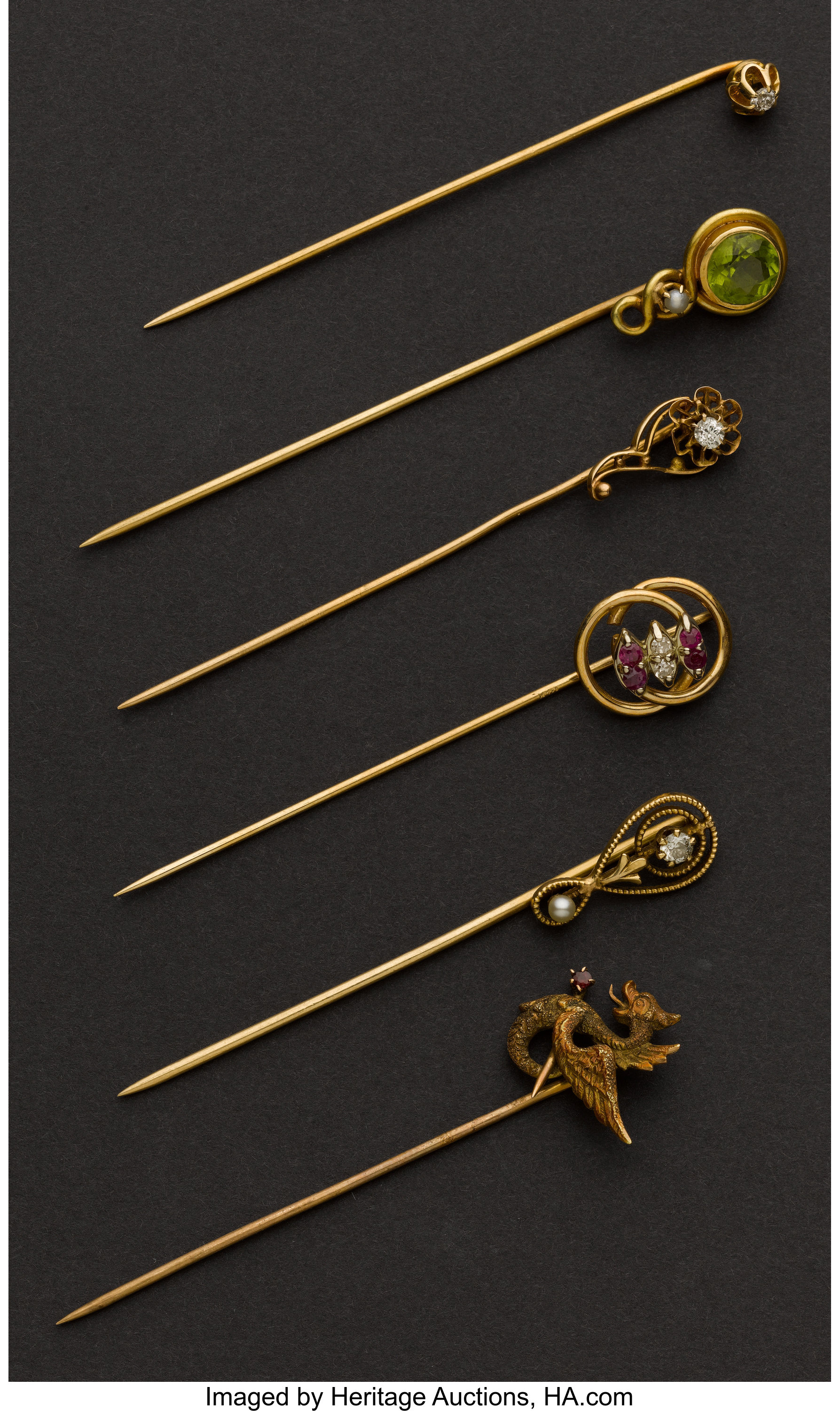 At Auction: Eight Gold Hat Stick Pins