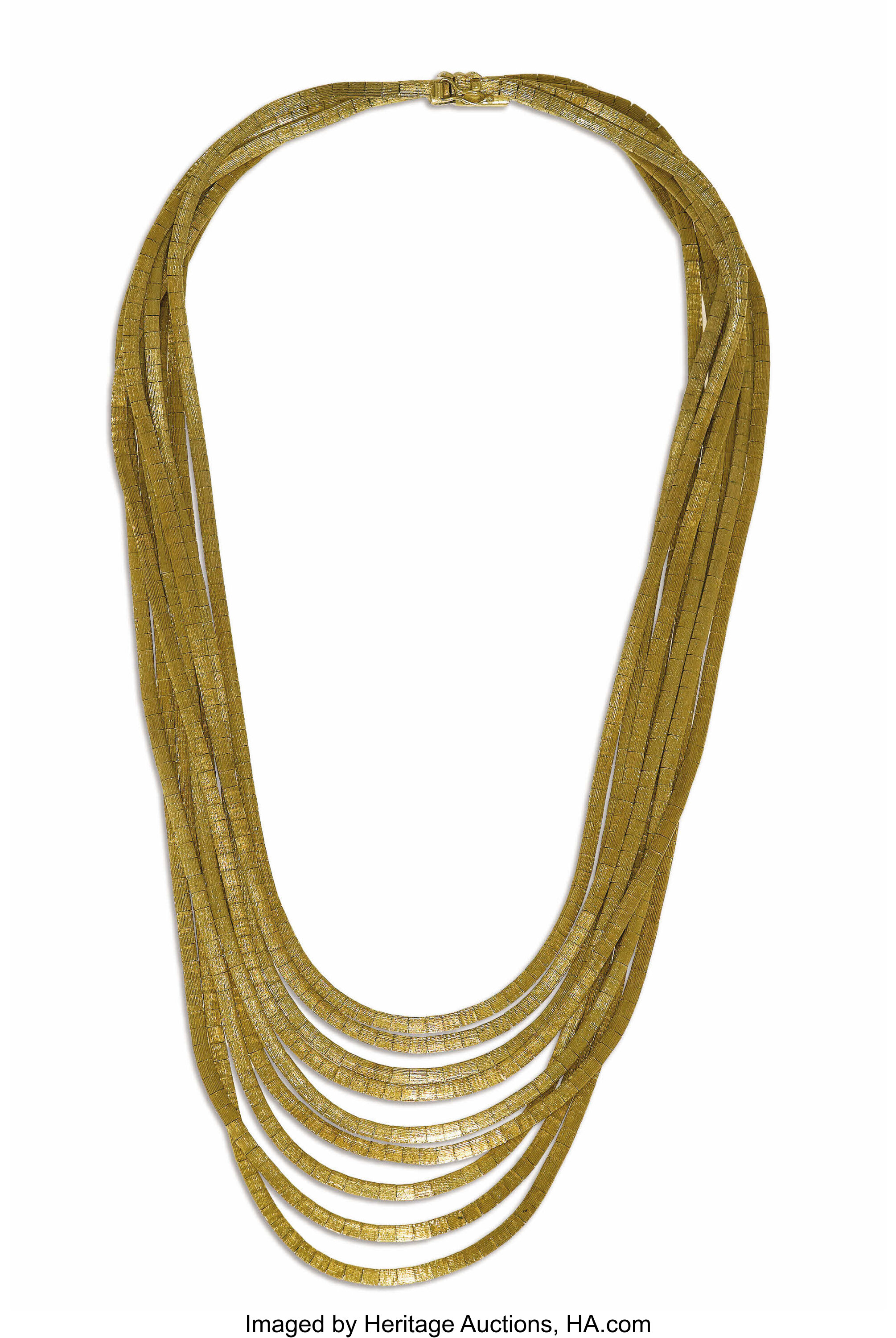 Gold Necklace. The spaghetti style necklace is composed of nine