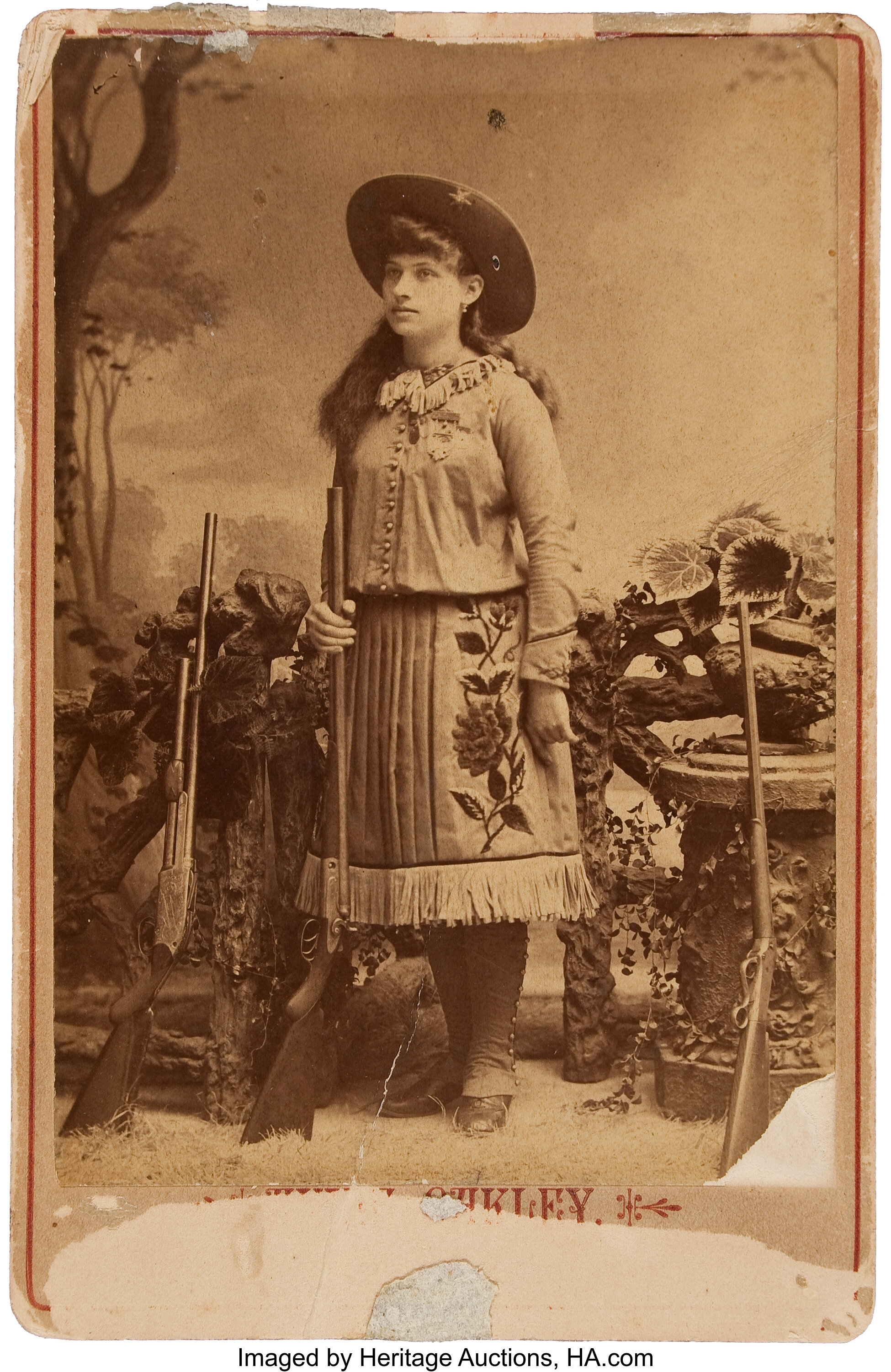 Annie Oakley with Three Guns: An Early Cabinet Photo.... | Lot #44011 |  Heritage Auctions