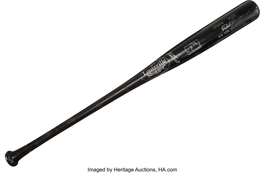 Louisville Slugger Baseball Bat on Building - Black and White