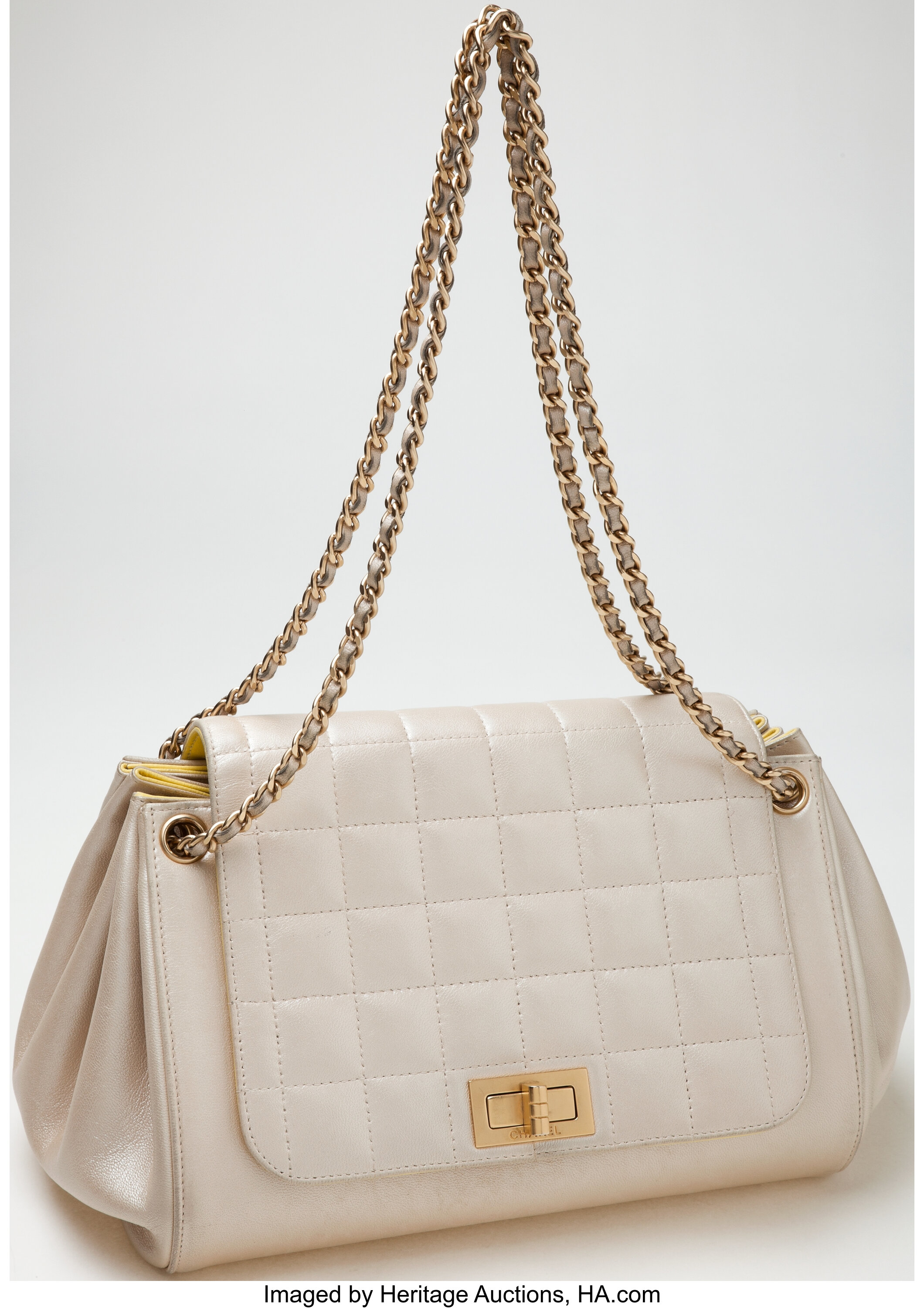 Sold at Auction: Vintage Chanel Quilted White Leather Handbag