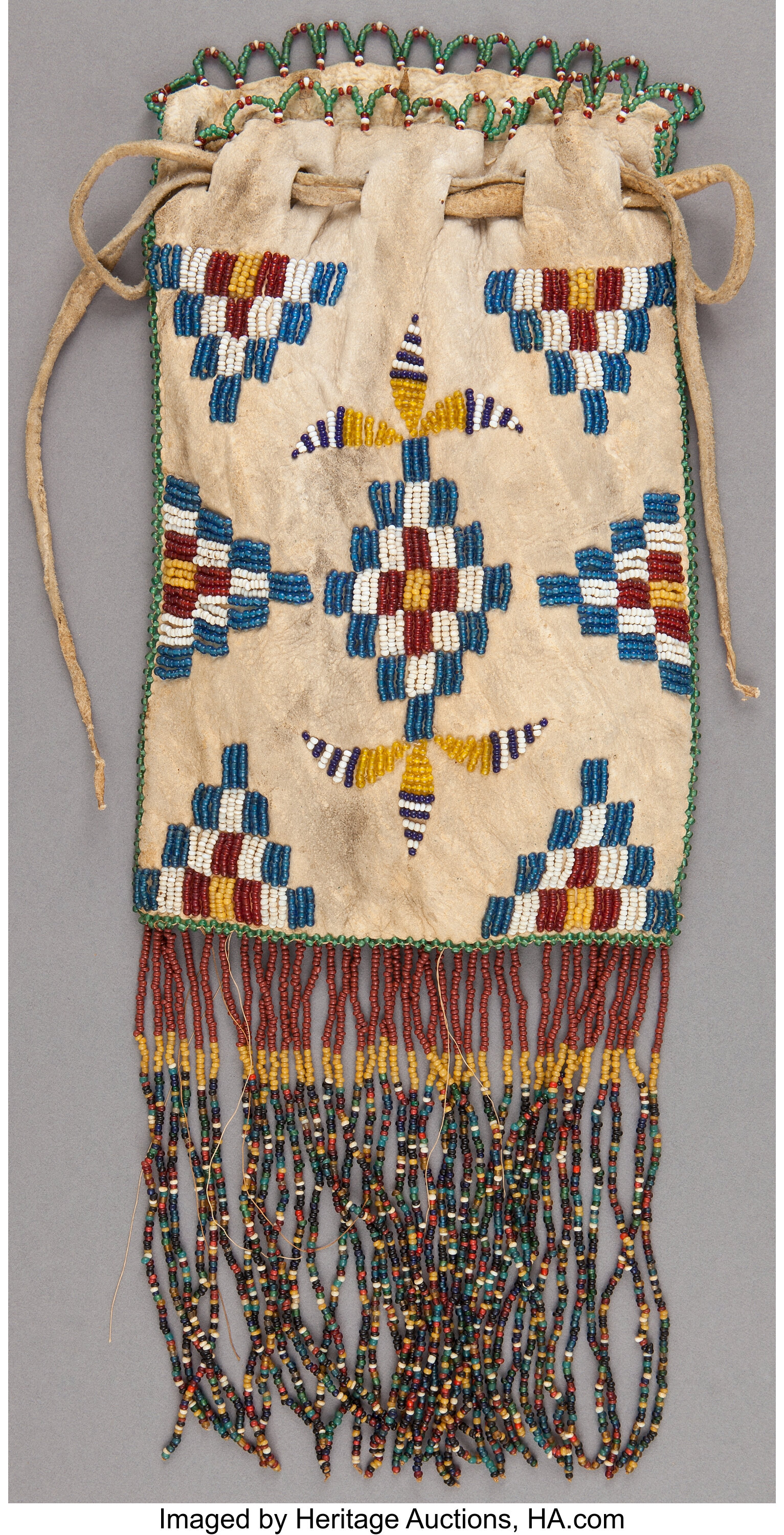 AN APACHE BEADED HIDE DRAWSTRING POUCH... Other | Lot #50405 | Heritage ...