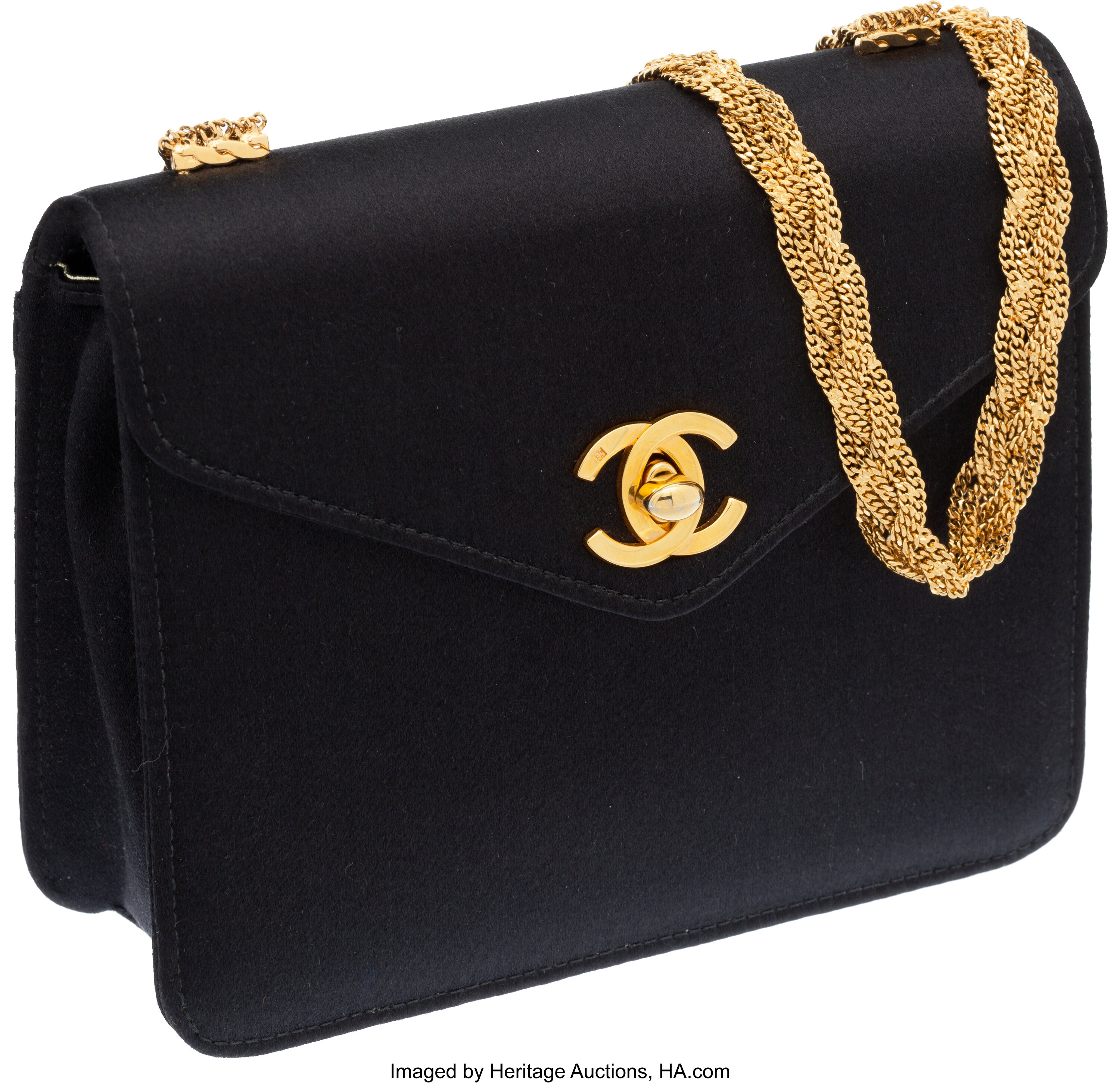 Sold at Auction: Chanel - a V-stitch flap shoulder bag in black