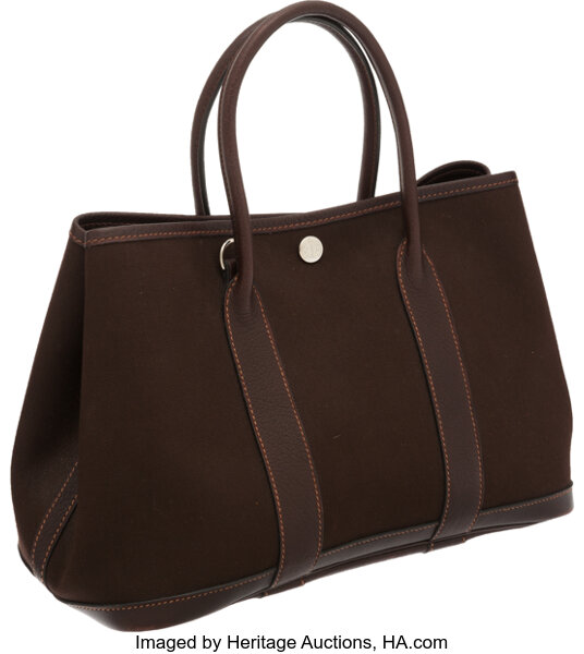 Sold at Auction: Hermes Leather And Canvas Tote Bag