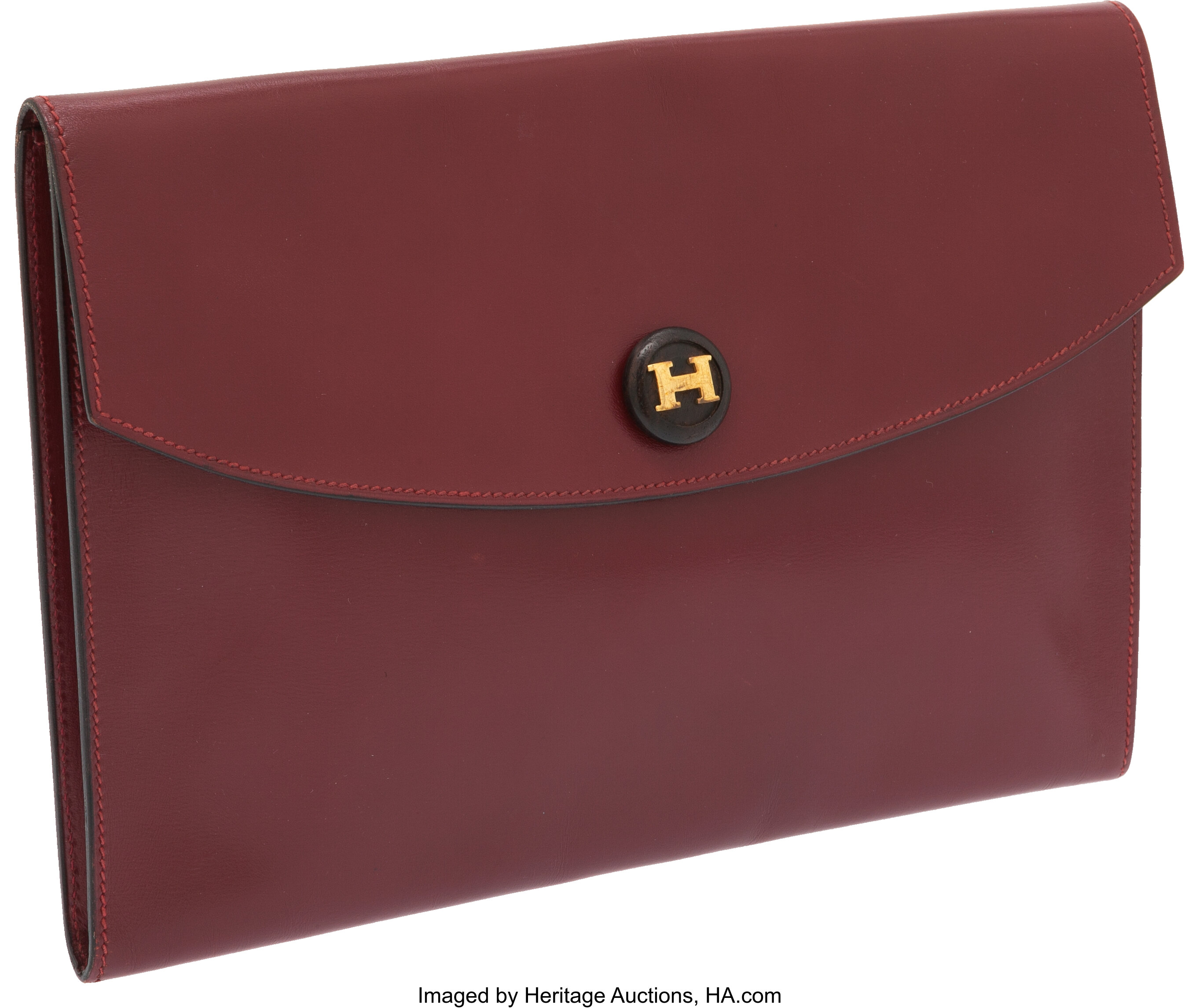 Lot - HERMES BROWN LEATHER RIO CLUTCH