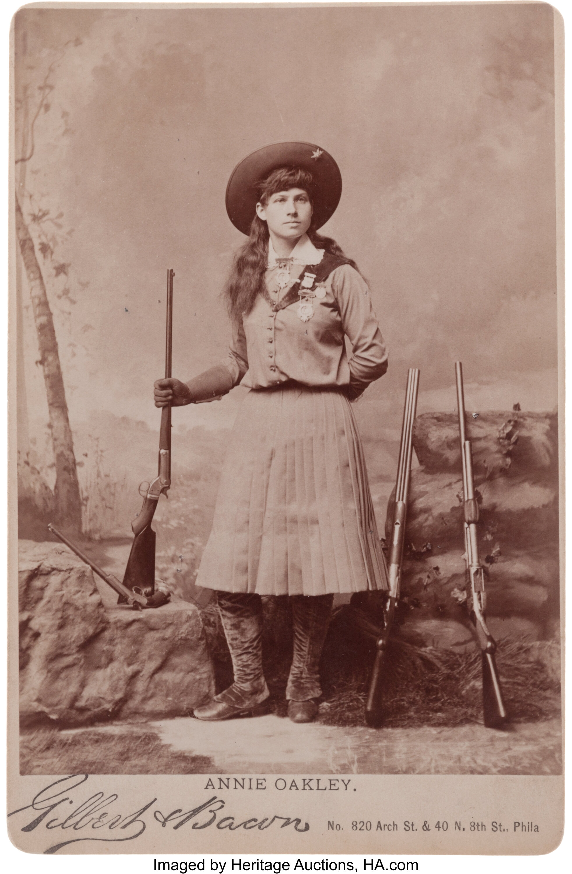 Cabinet Photo of Annie Oakley with Four Guns. ... Photography | Lot #38356  | Heritage Auctions