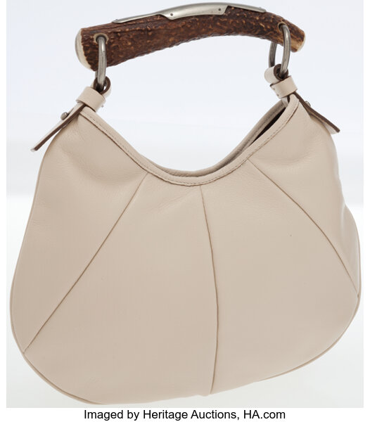 Yves Saint Laurent Mombasa handbag in beige canvas and beige