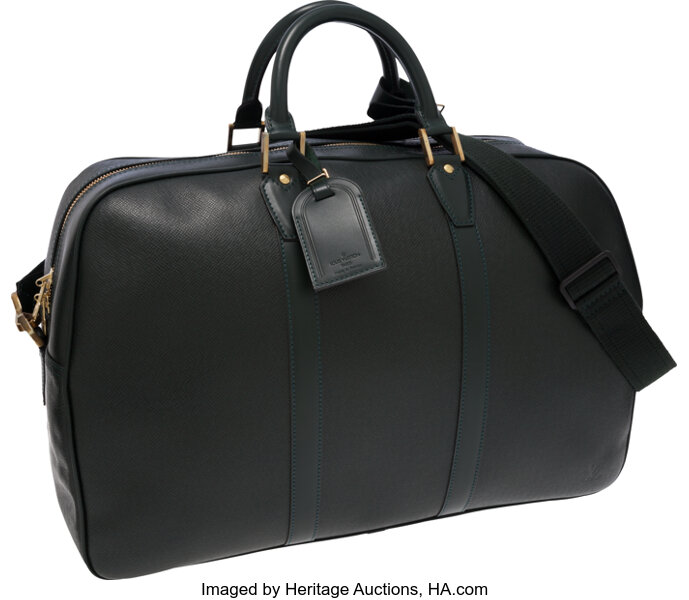 Sold at Auction: AUTHENTIC LOUIS VUITTON VINTAGE TAIGA LEATHER CLUTCH BAG