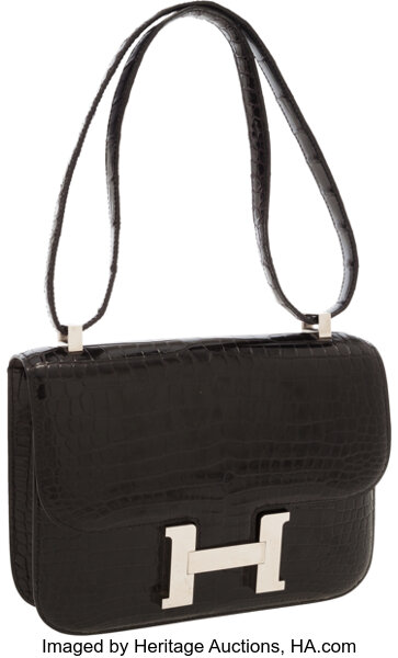 Hermès Vintage Shiny Black Porosus Crocodile Bag with Gold Hardware 28,  1940. For Sale at 1stDibs