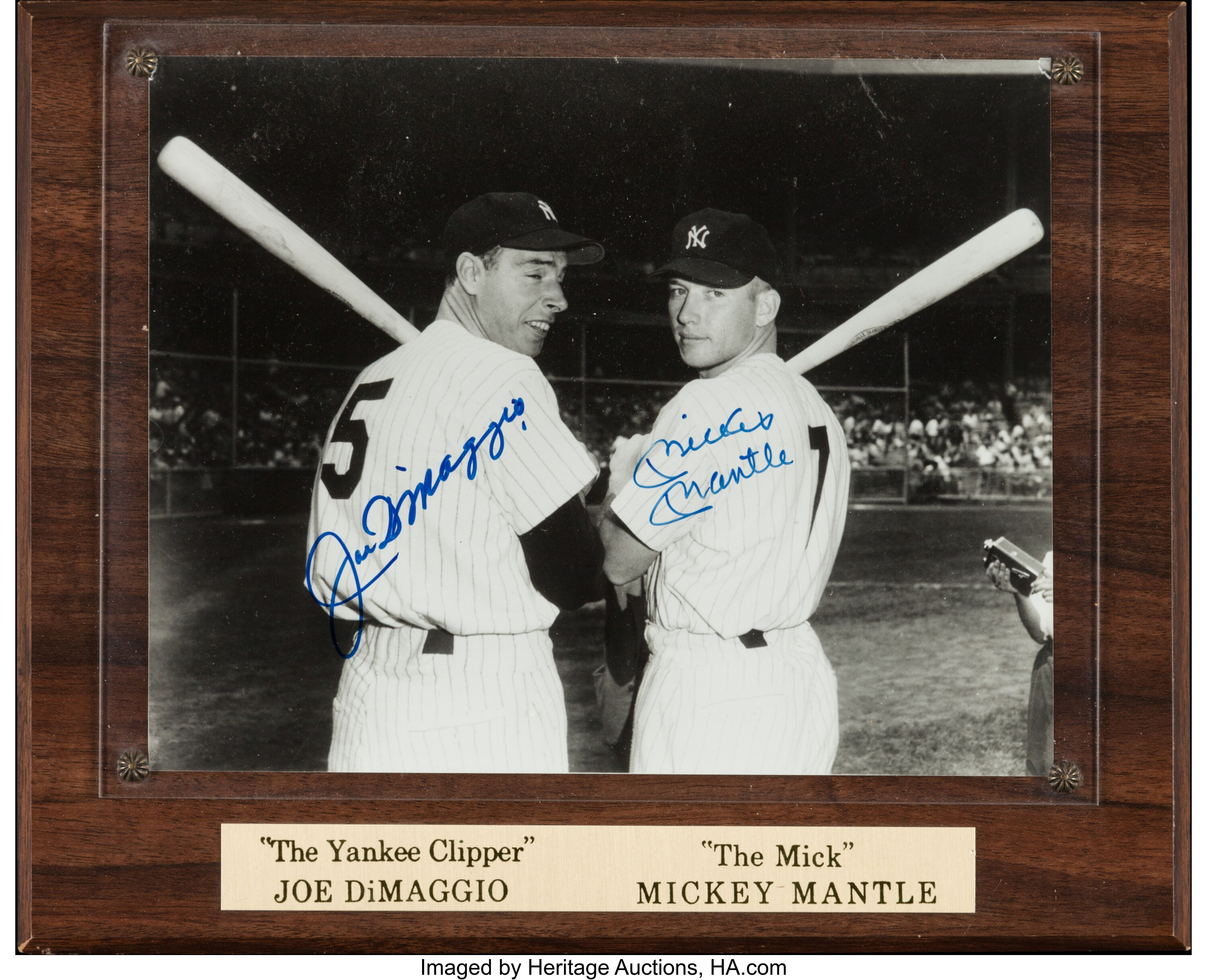 Joe Dimaggio And Mickey Mantle Holding by Bettmann