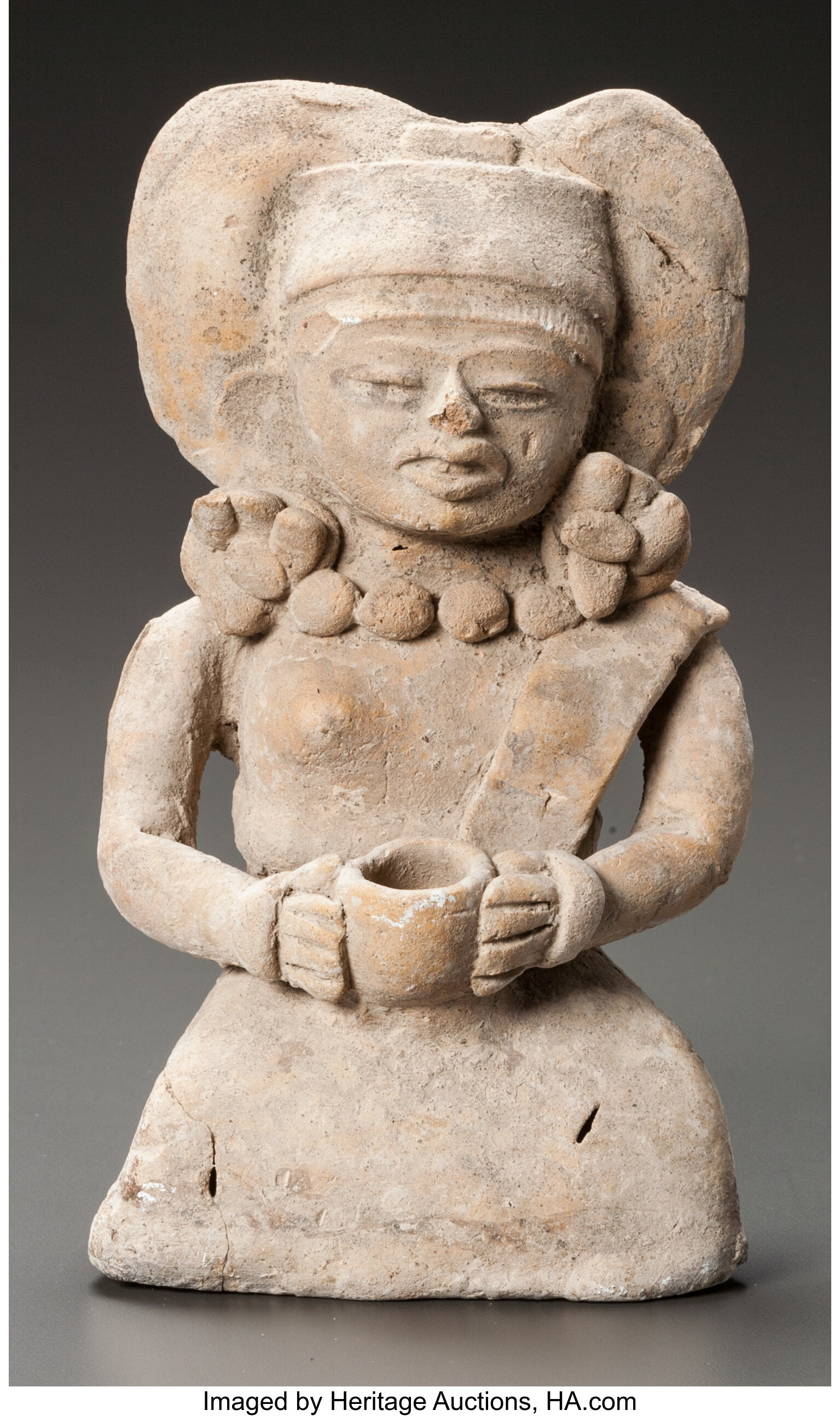 A MAYA FEMALE FIGURE HOLDING A BOWL. c. 600 - 900 AD... Ceramics