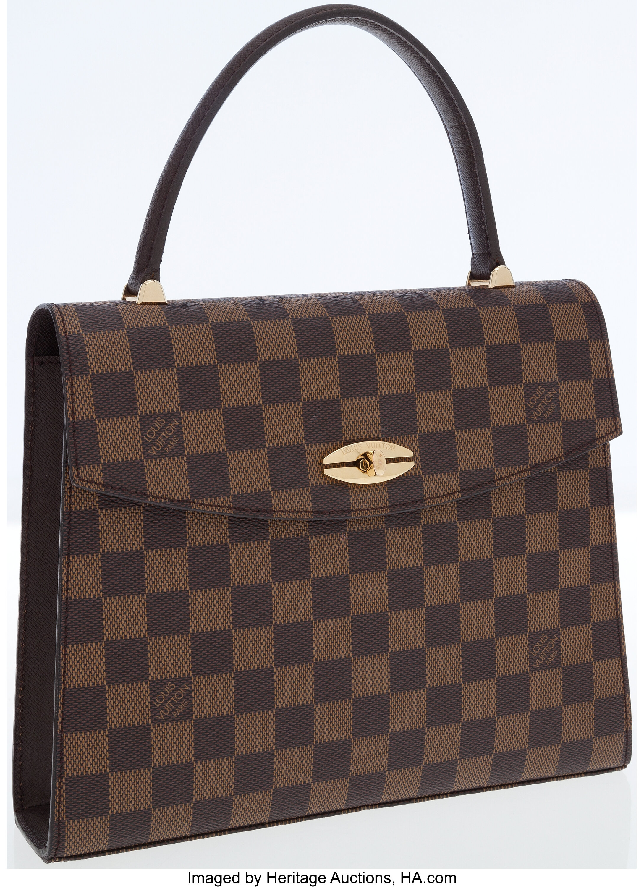 A Louis Vuitton Monogram Canvas Travel Pouch, 9 x 2.5. sold at auction on  26th October
