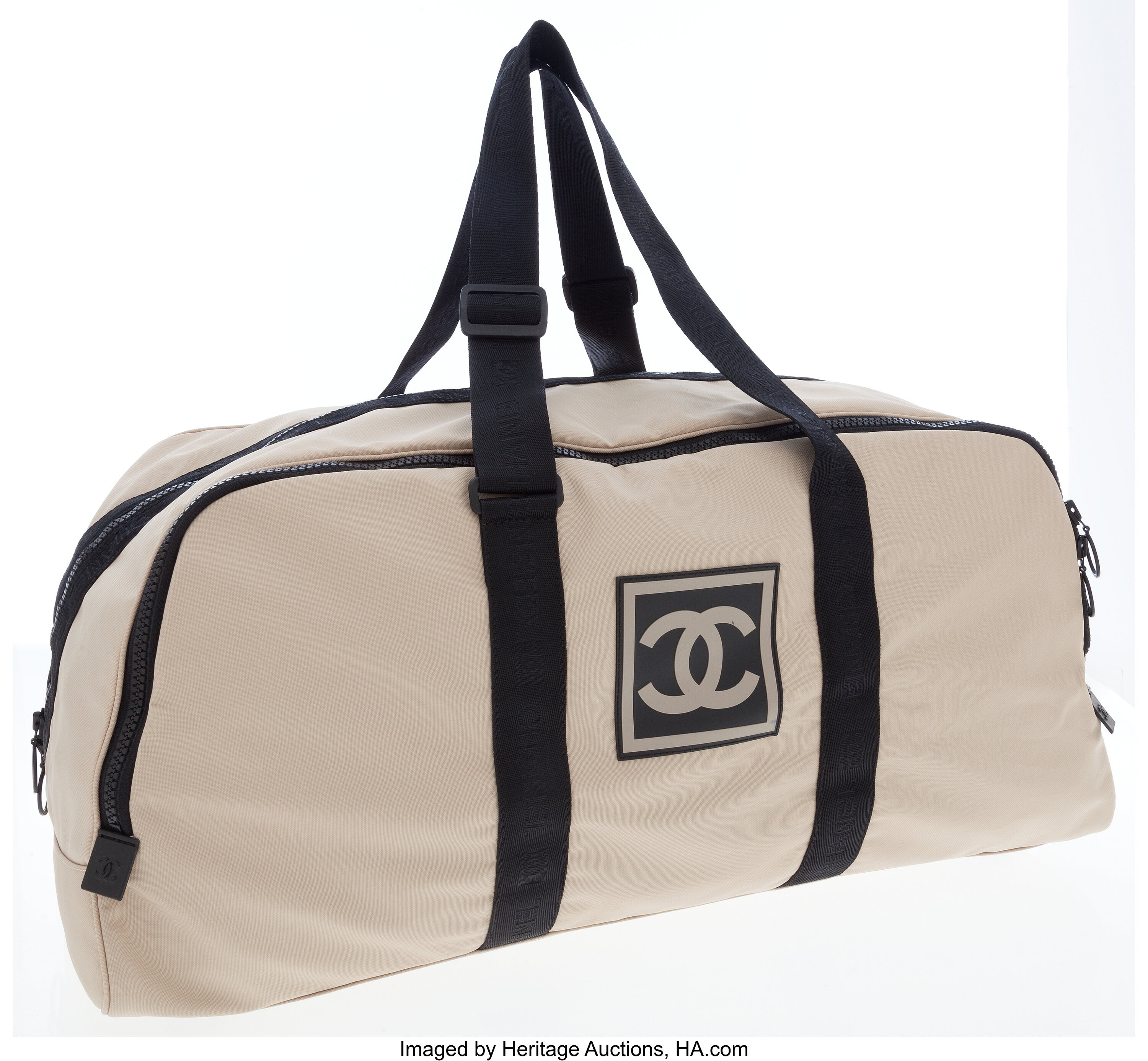 Chanel Tan & Black Canvas Carryall Travel Bag. ... Luxury | Lot #79008 |  Heritage Auctions