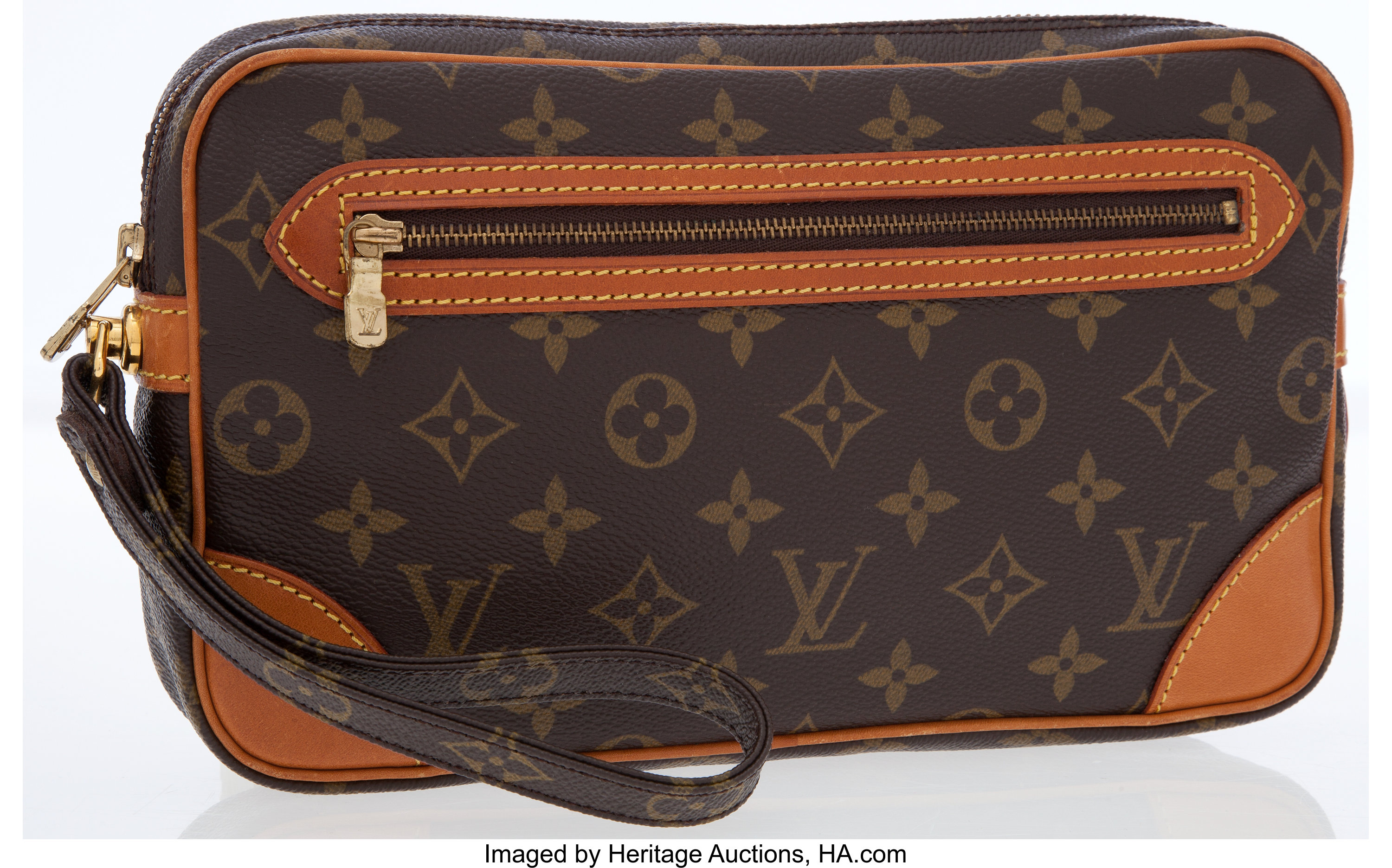 Sold at Auction: LOUIS VUITTON Clutch in monogram canvas and
