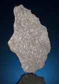 Meteorites:Irons, SLICE OF TAZA METEORITE FROM THE SAHARA DESERT: NWA 859 . Iron,
Ungrouped. Taza, Morocco. Found: 2001. ...