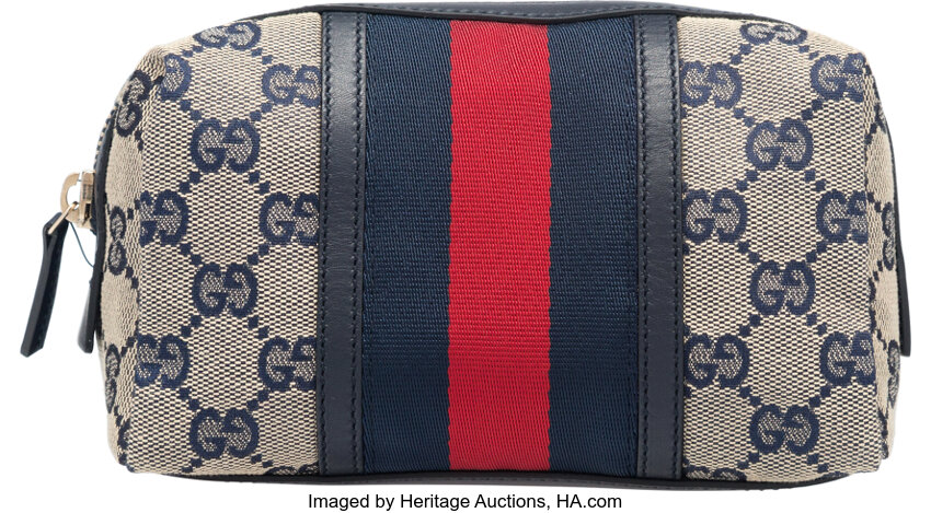 Sold at Auction: GUCCI AND LOUIS VUITTON. 1) BLUE LEATHER GUCCI
