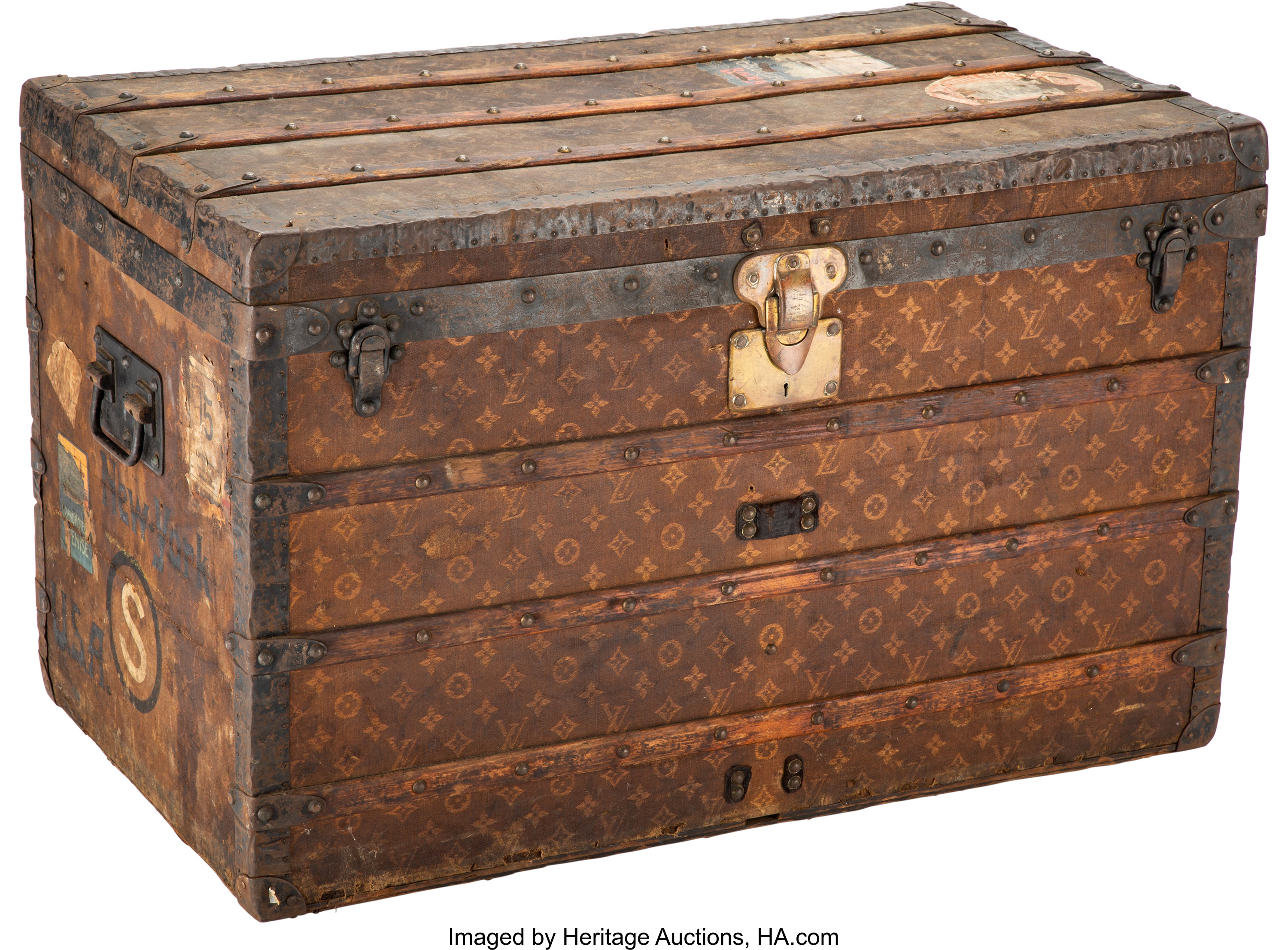 Sold at Auction: A travel trunk by Louis Vuitton, first half 20th century.