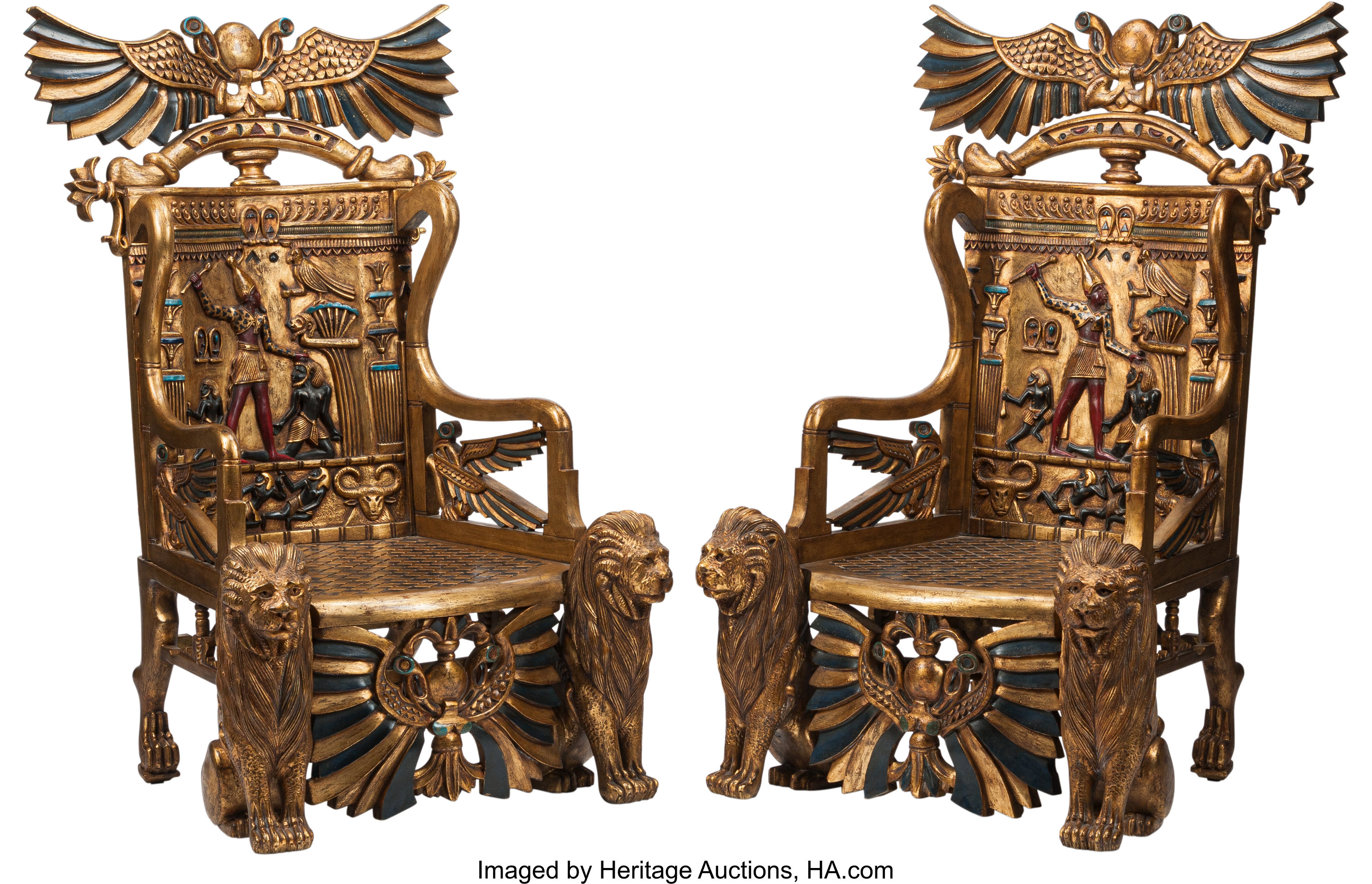 A Pair Of Egyptian Revival Carved And Painted Wood Throne Chairs