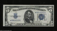 Fr. 1650* $5 1934 Silver Certificate. Choice About Uncirculated. A single long horizontal fold prevents the CU grade fro...