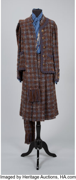 A Coco Chanel Bouclé Wool Suit with Scarf, with a Coco Chanel Silk