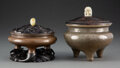 Decorative Accessories, Two Chinese Censers with Jade Finials. Marks to bronze example:
four-character mark. 6-3/4 x 6 x 6 inches (17.1 x 15.2 x 15....
(Total: 2 Items)