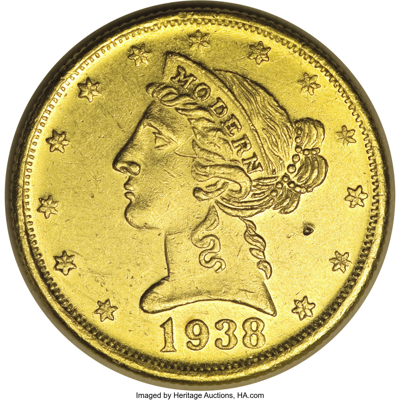 1938 Modern Jewelry Co. A privately produced gold token that appears