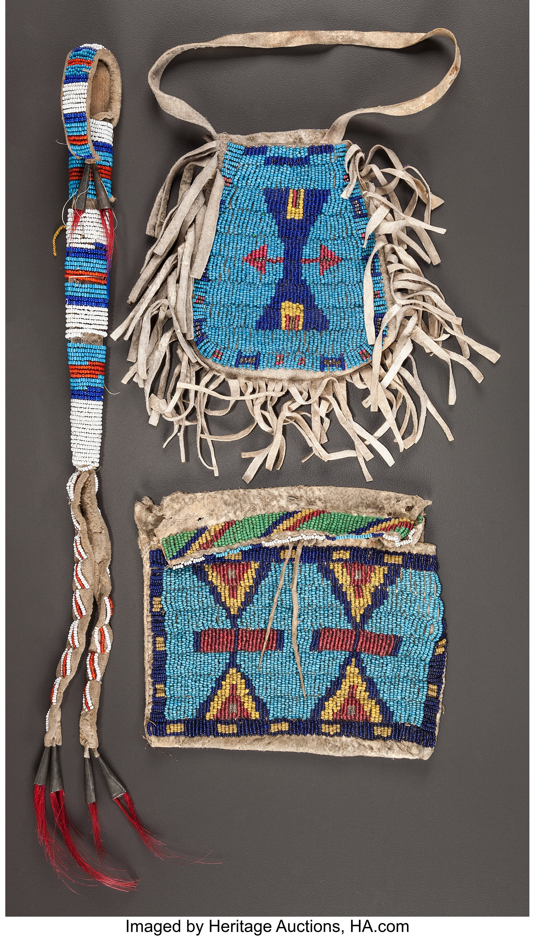 A SIOUX BEADED HIDE AWL CASE AND TWO POUCHES. c. 1890... (Total: 3 ...